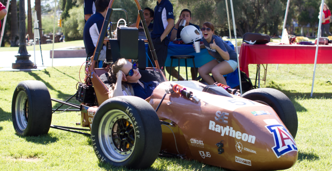 Student in a self-built car on the Arizona campus